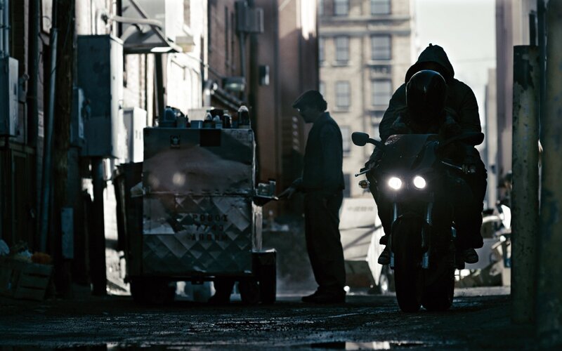 Motorcycle in a dim alley