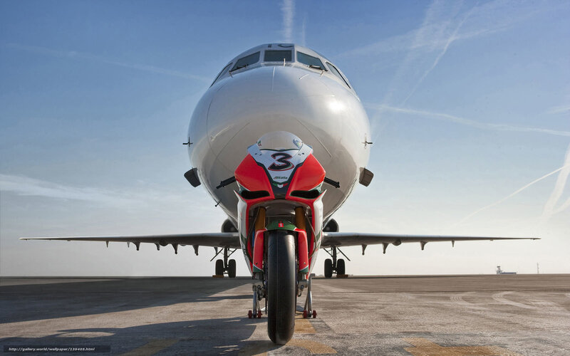 Motorcycle in Front of Airplane