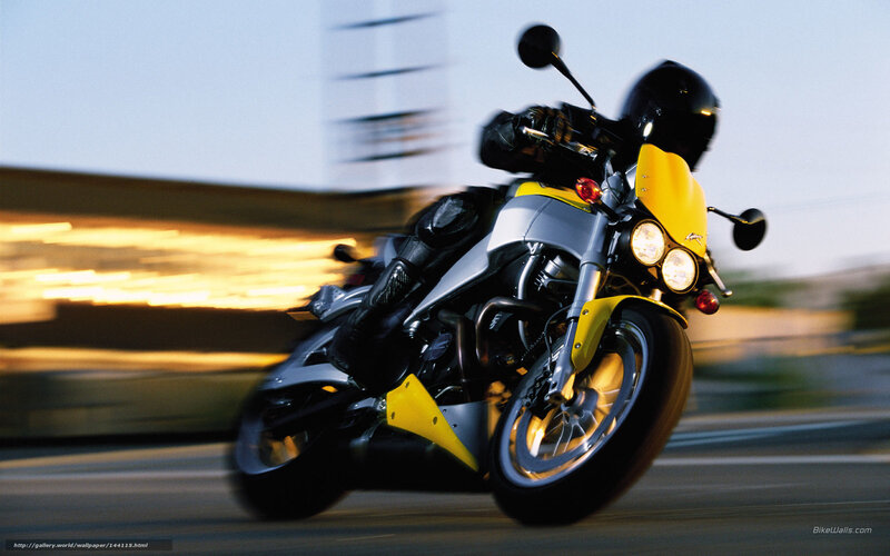 motorcycle in motion at dusk