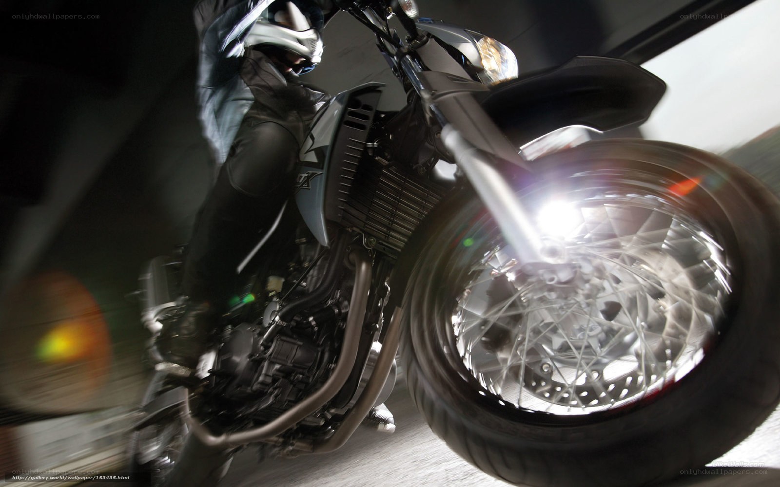 Motorcycle in motion at night