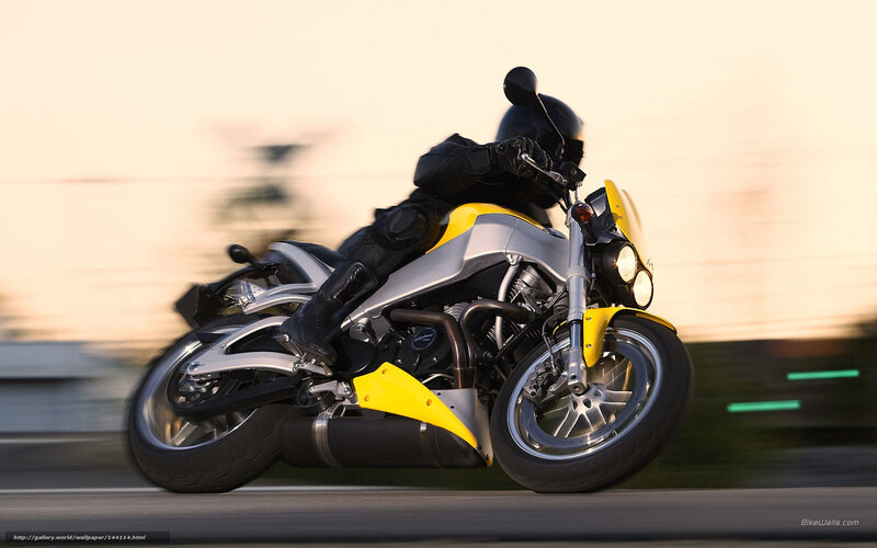 motorcycle in motion at sunset