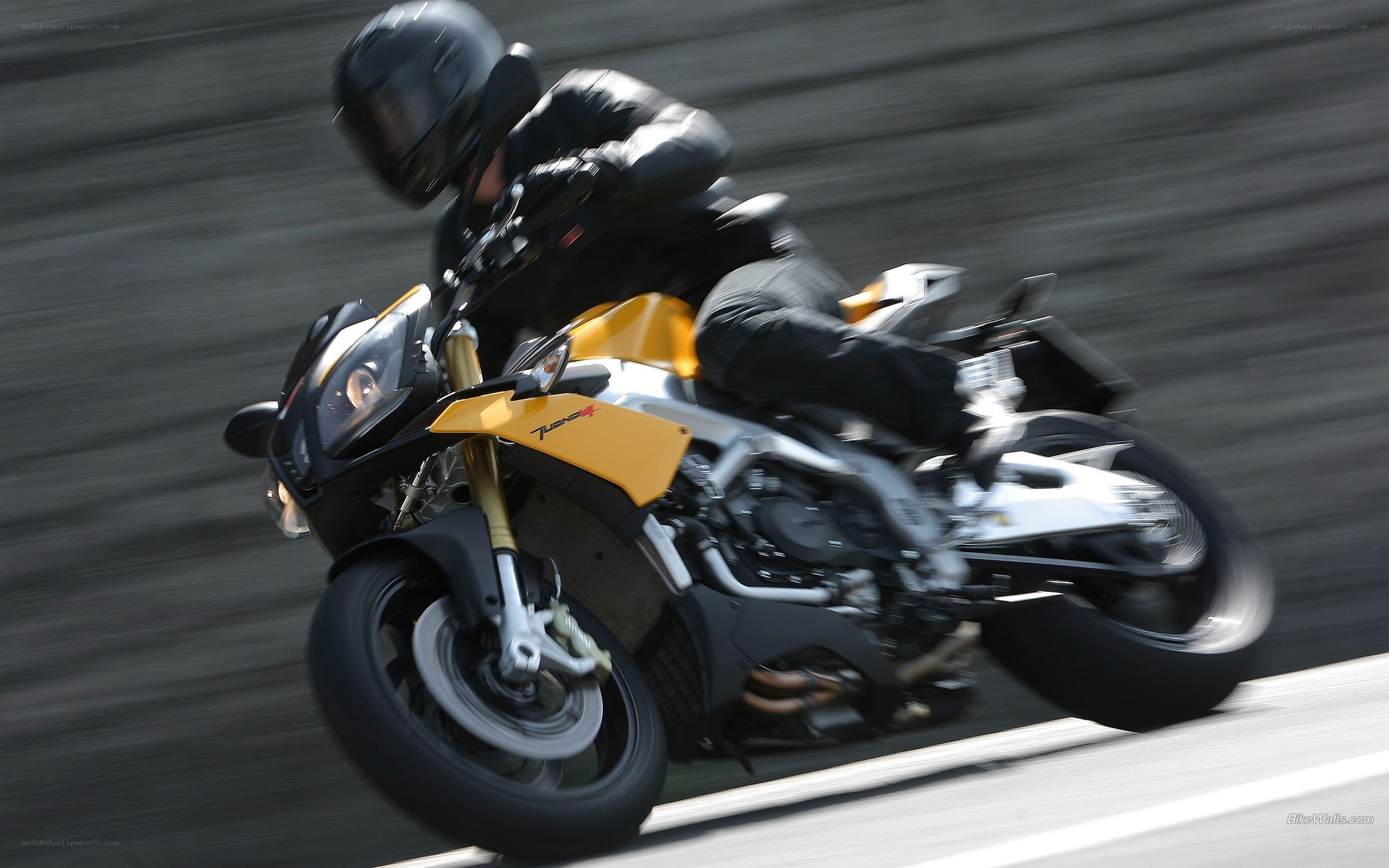 motorcycle in motion on track