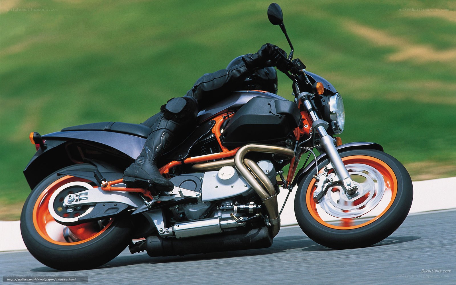 motorcycle in motion on track