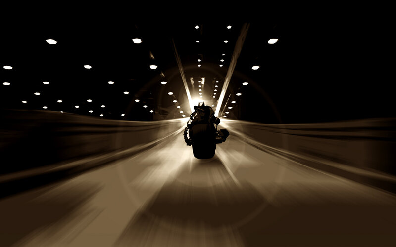 Motorcycle in tunnel at night