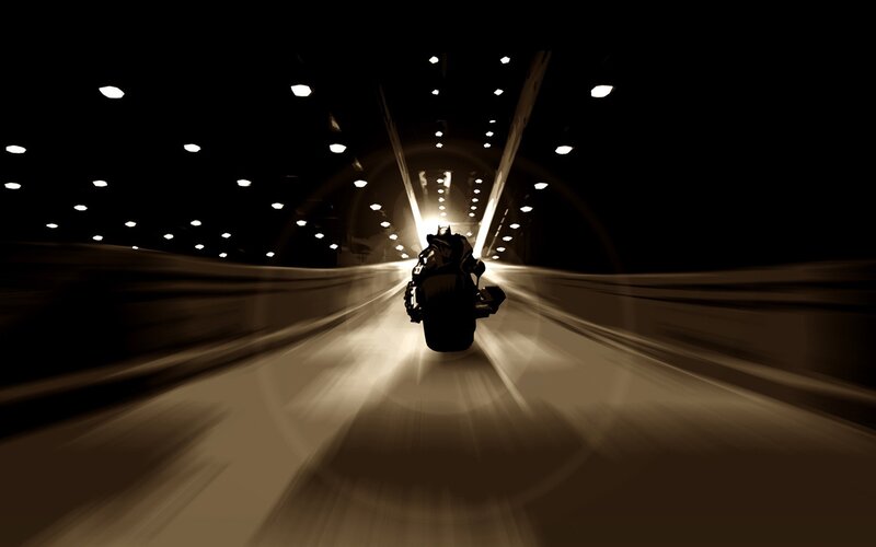 motorcycle in tunnel at night