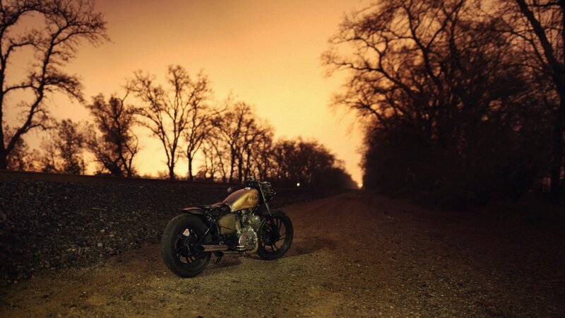 motorcycle on a rural road at dusk
