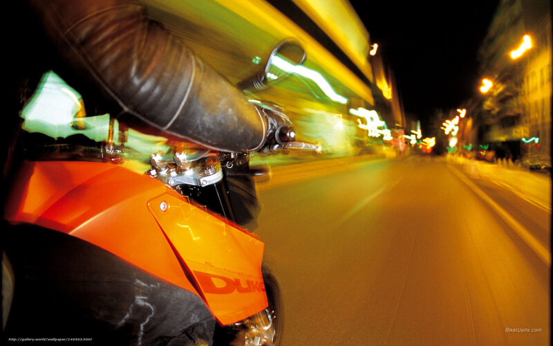 Motorcycle on City Street — Orange