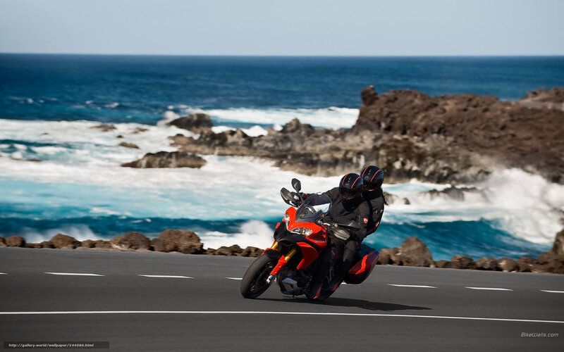 Motorcycle on Coastal Road — Blue