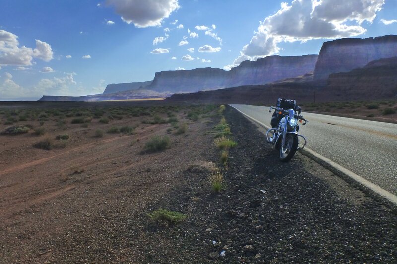 Motorcycle on Desert Road — Blue, Serene