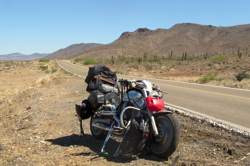 Motorcycle on Desert Road — Brown