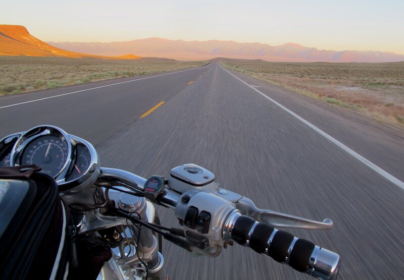 Motorcycle on Desert Road — Gray, Serene