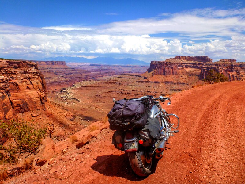 Motorcycle on Dirt Road — Red