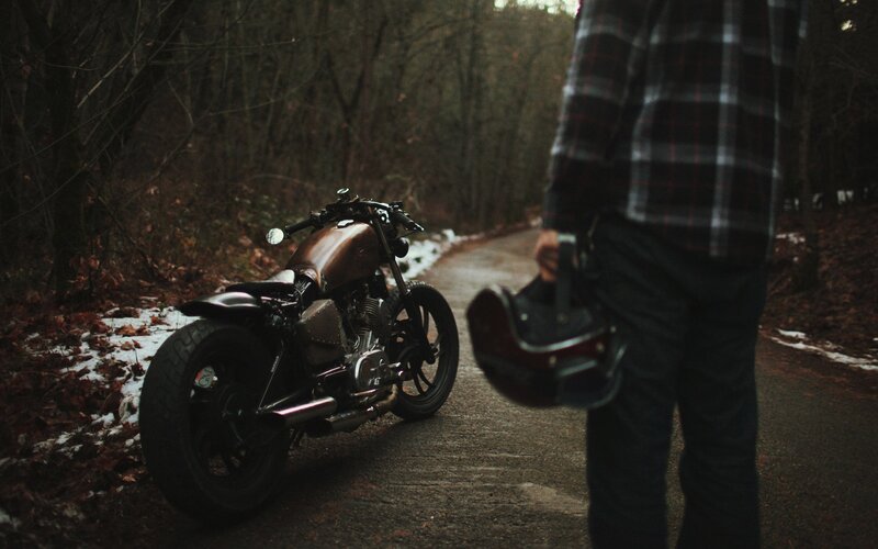 Motorcycle on Forest Path