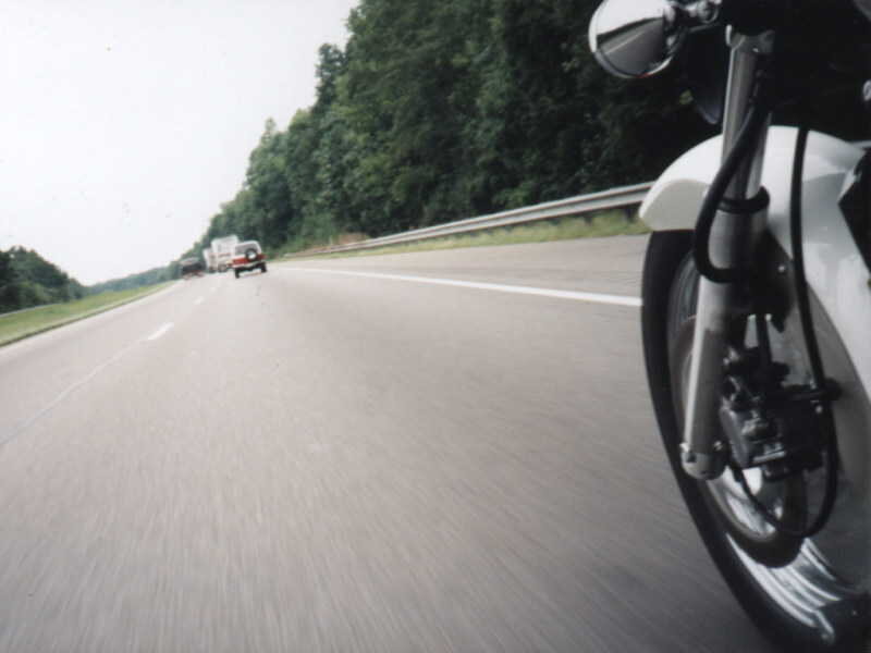Motorcycle on Highway — Gray