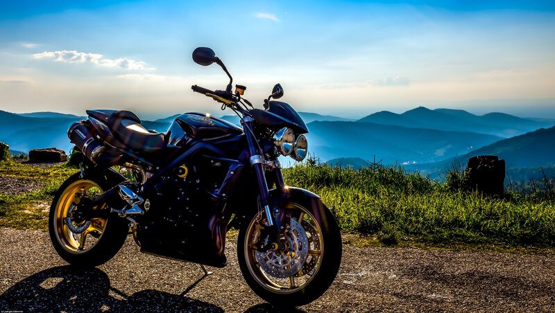 motorcycle on mountain overlook
