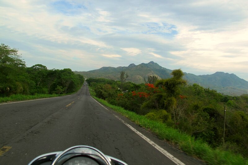 Motorcycle on Mountain Road — Green, Serene