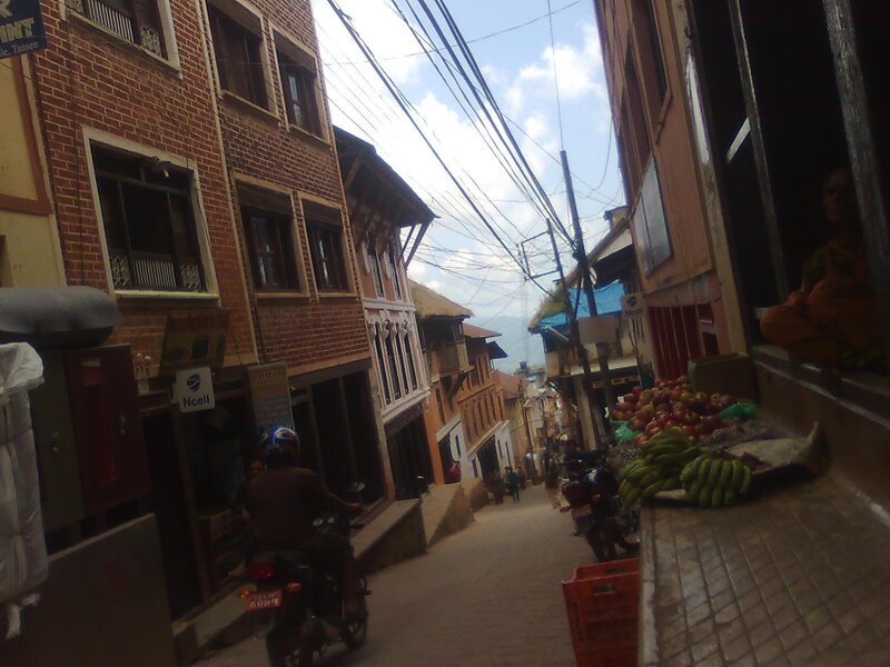 Motorcycle on Narrow Street
