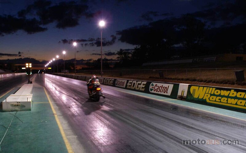 Motorcycle on Racetrack — Dark Blue