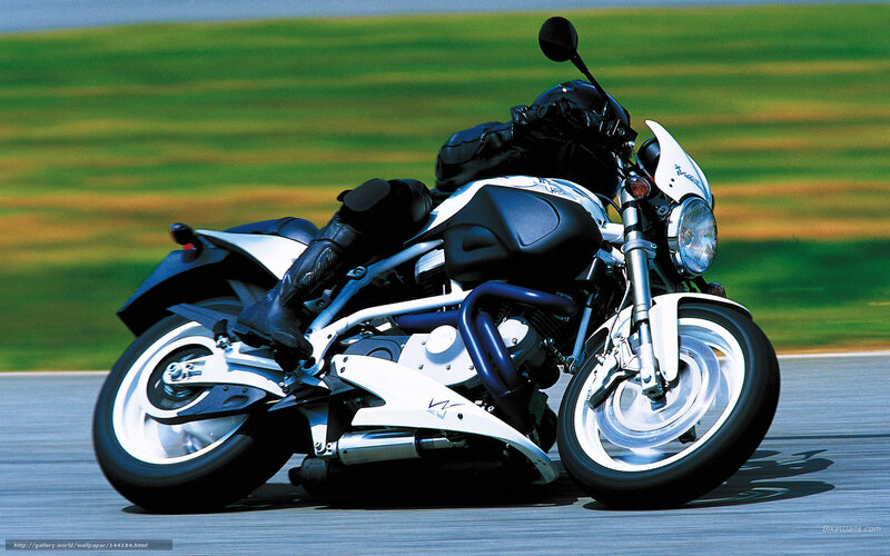 Motorcycle on Racetrack — White, Dynamic, Afternoon