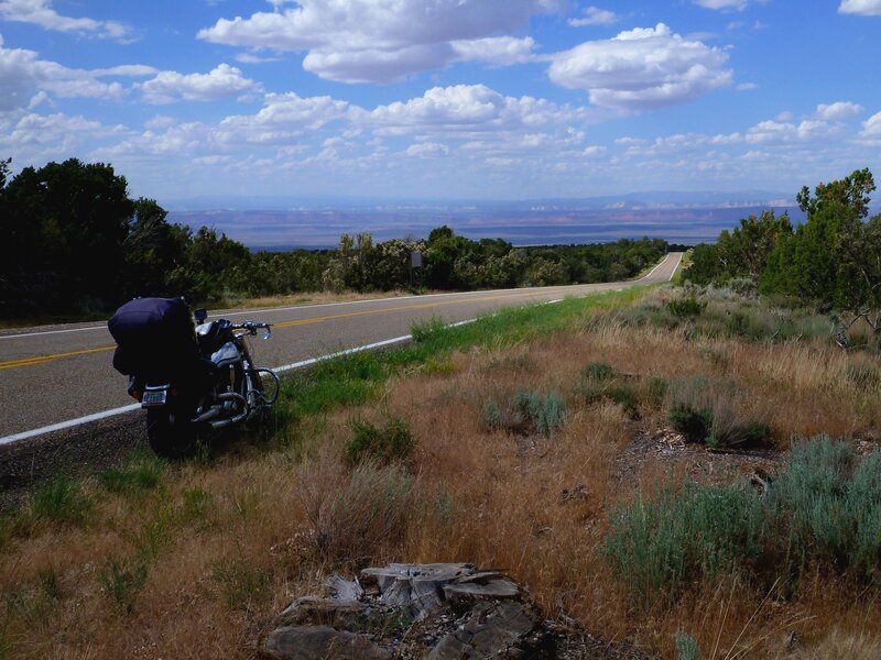 Motorcycle on Roadside — Blue, Serene, Afternoon, Photograph