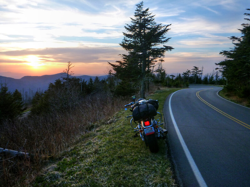 Motorcycle on Roadside — Blue, Serene, Sunset