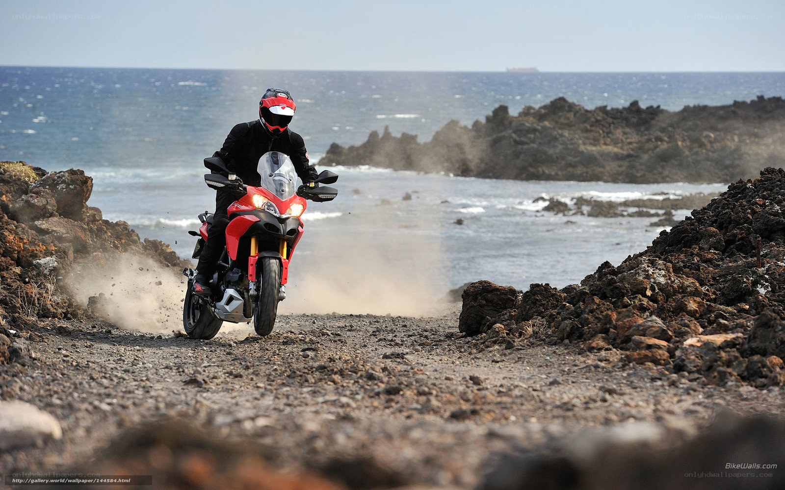 motorcycle on rocky coast
