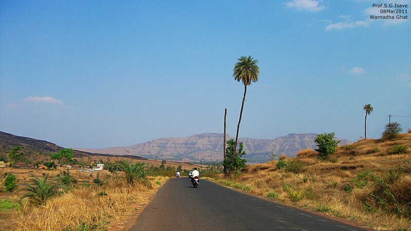 Motorcycle on Rural Road — Blue