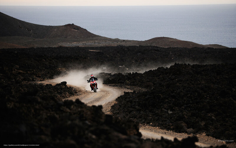 Motorcycle on volcanic terrain