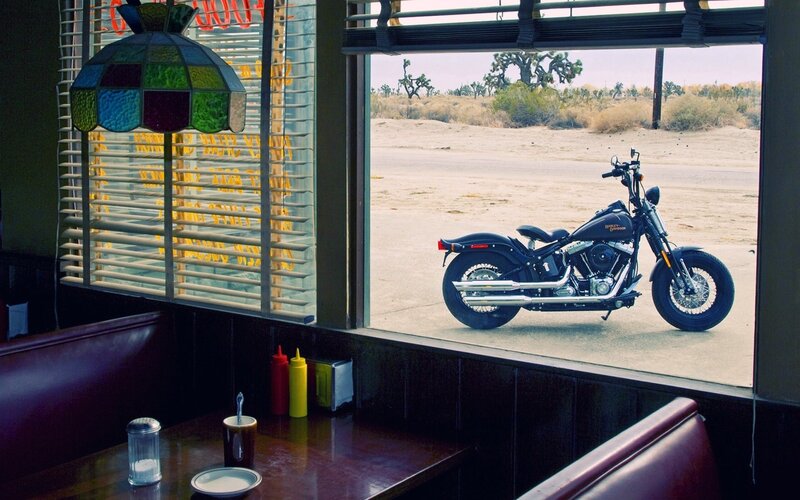 Motorcycle outside diner window