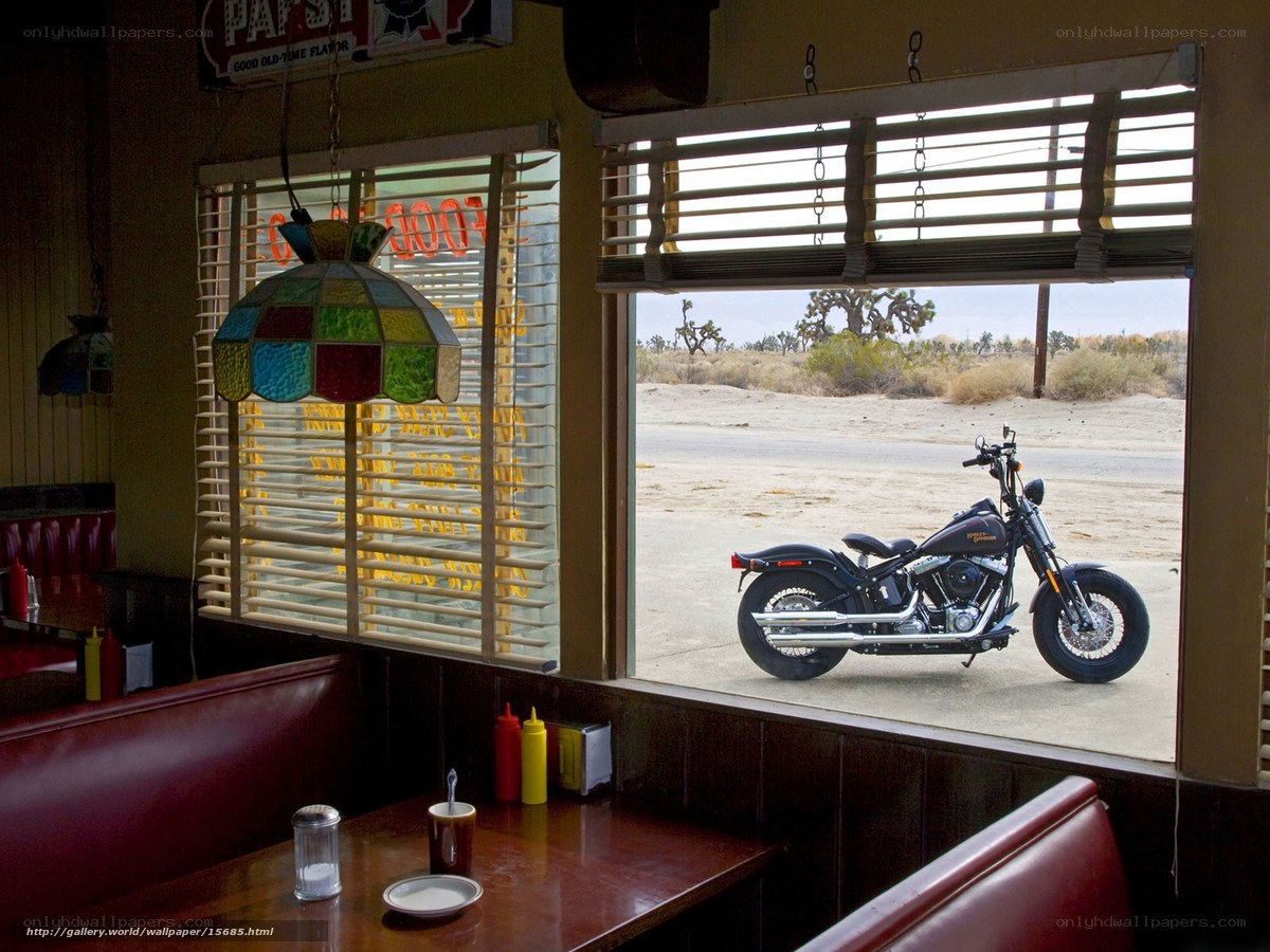 Motorcycle outside diner window