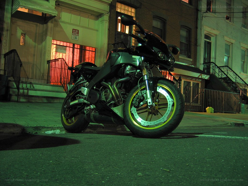 motorcycle parked on city street