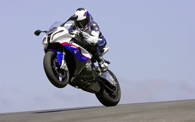 motorcycle performing wheelie