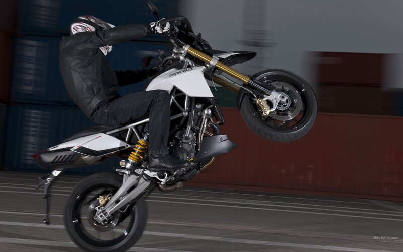 motorcycle performing wheelie