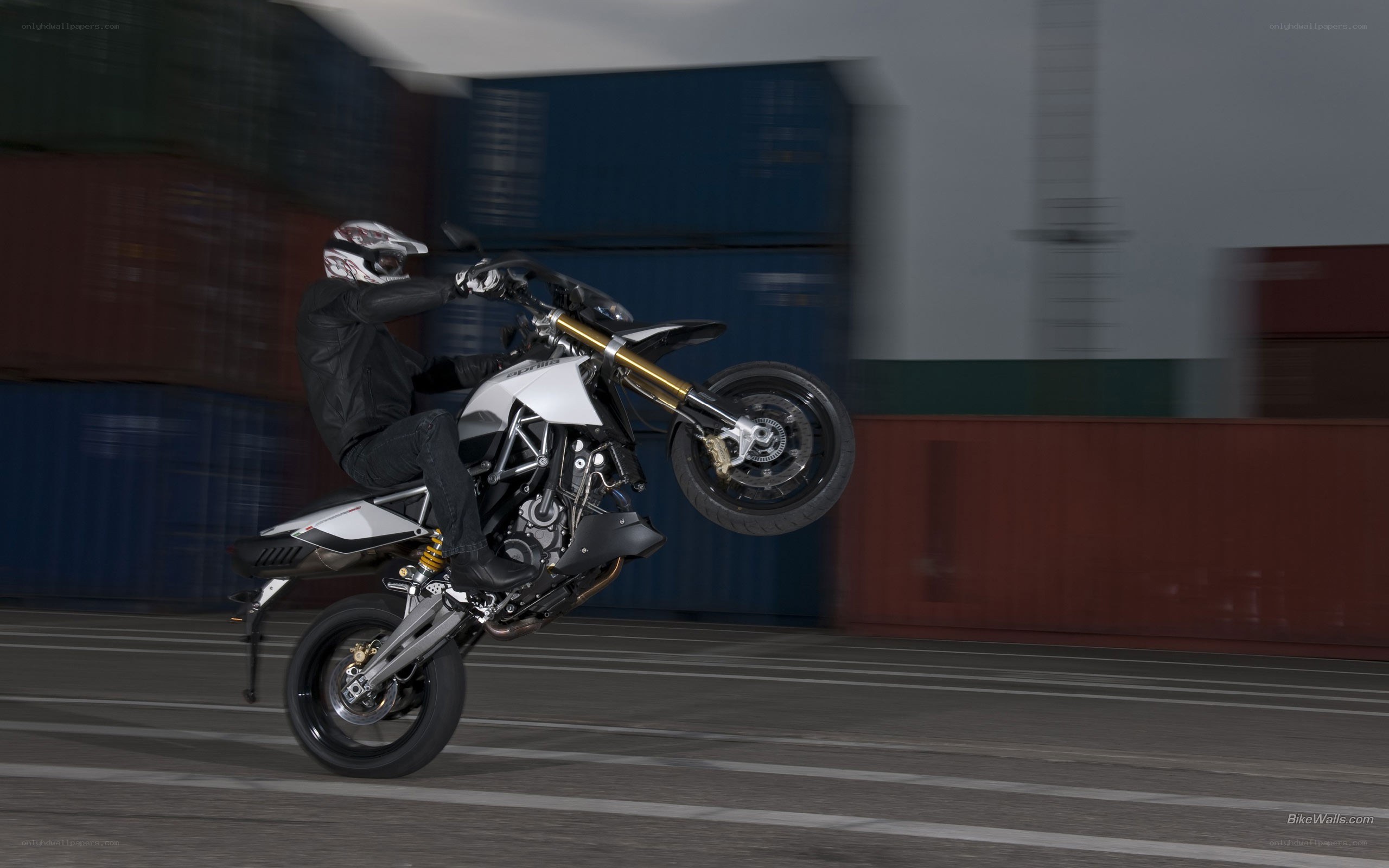 motorcycle performing wheelie