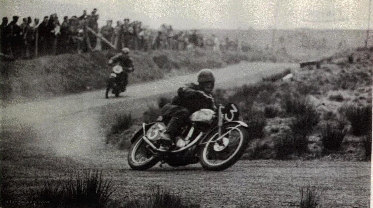 Motorcycle race on dirt road