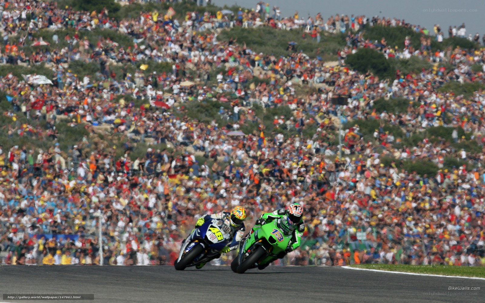 Motorcycle race with crowd