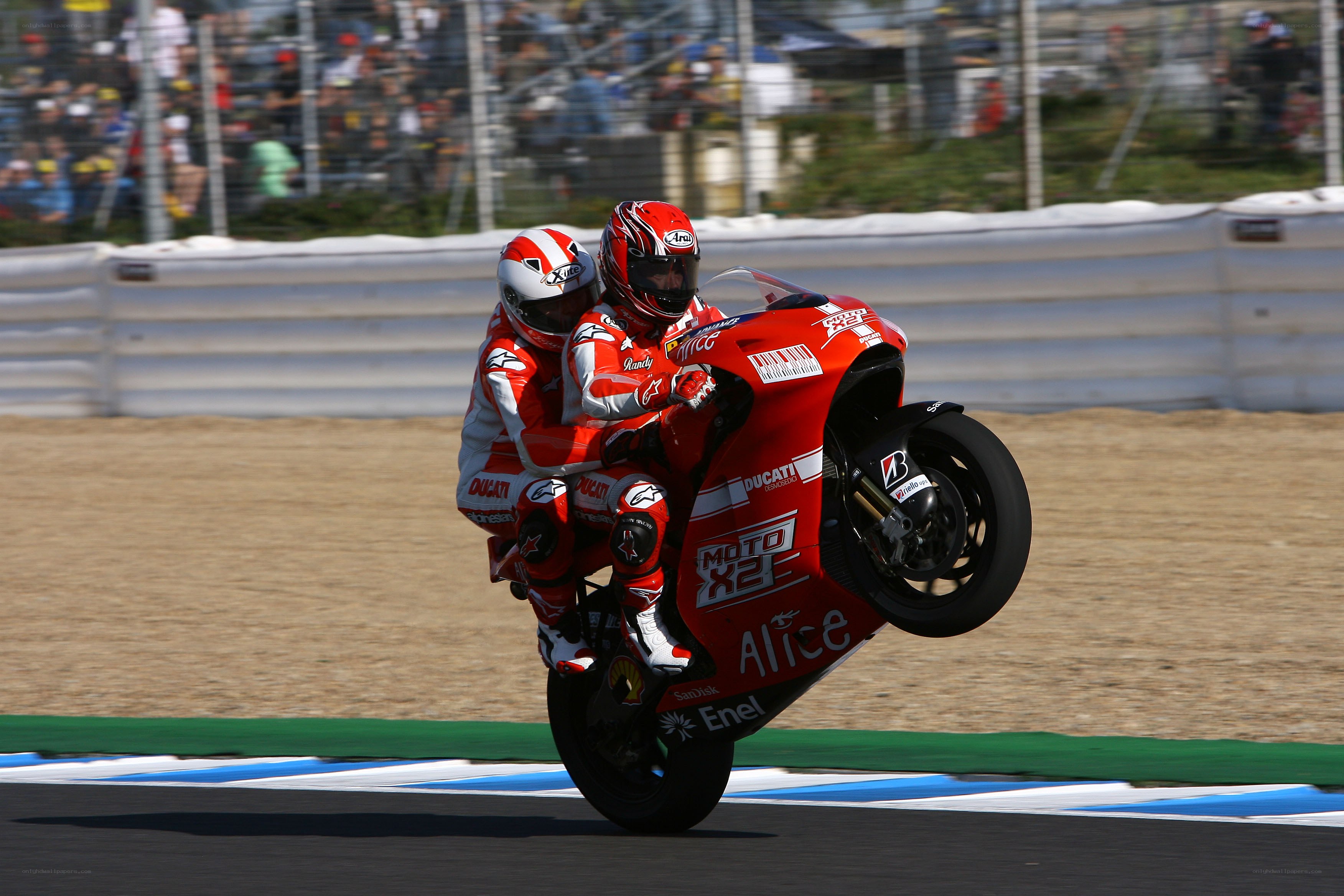 Motorcycle race with wheelie