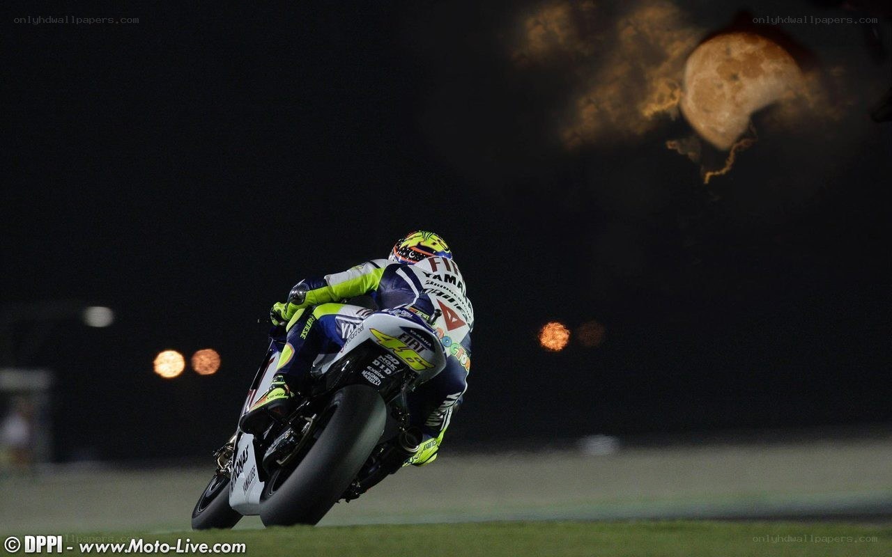 motorcycle racer at night