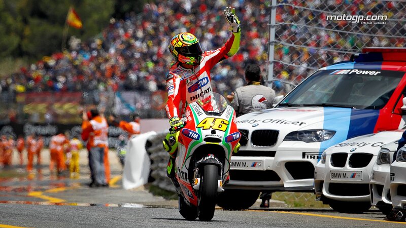Motorcycle racer celebrates victory