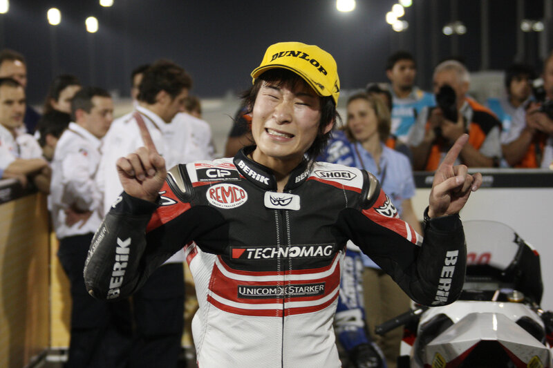 Motorcycle racer celebrates victory