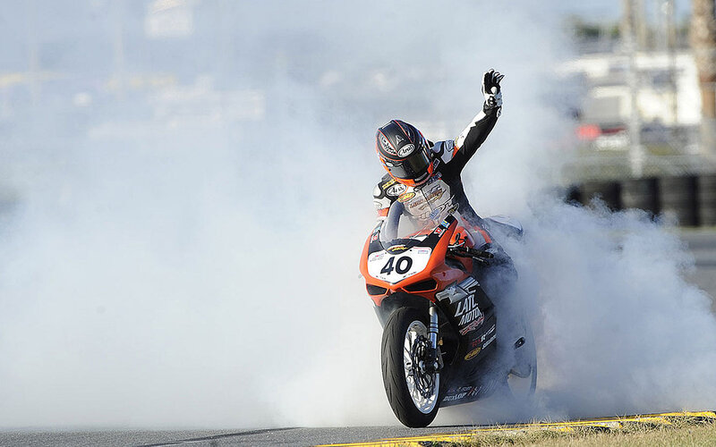 Motorcycle Racer Celebrating