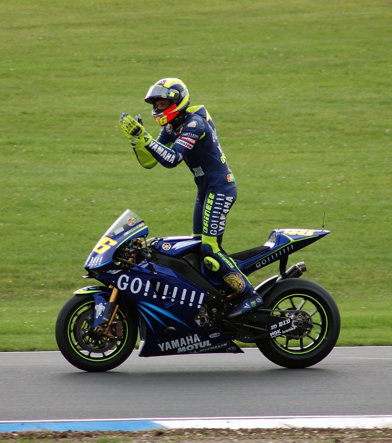Motorcycle racer celebrating victory