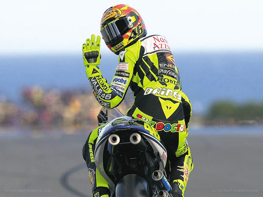 Motorcycle racer celebrating victory