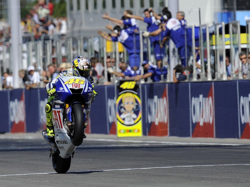 Motorcycle racer celebrating win
