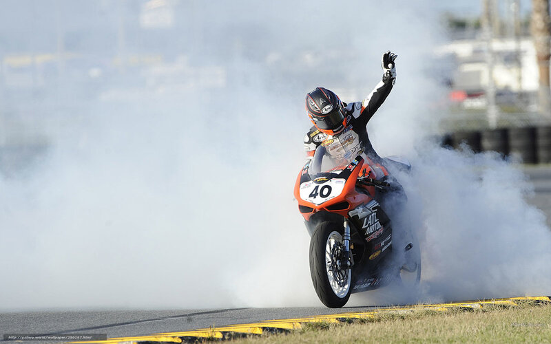 motorcycle racer celebrating win