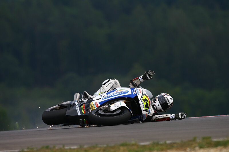 Motorcycle racer in a crash