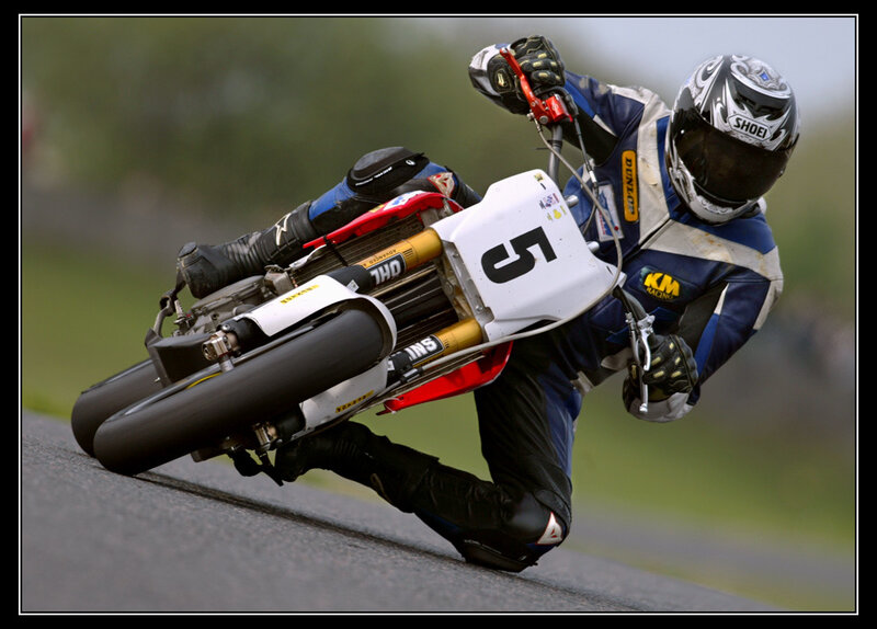 Motorcycle racer in a sharp turn
