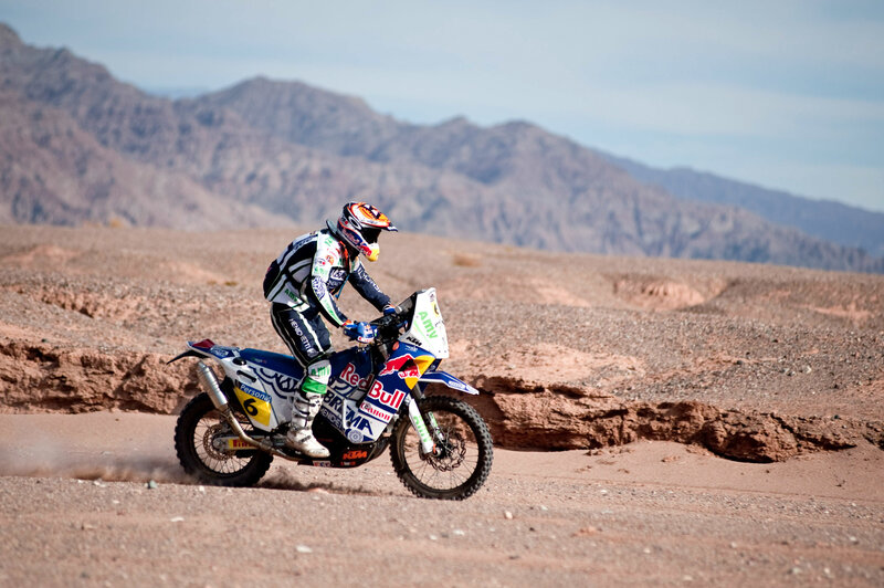 Motorcycle racer in desert