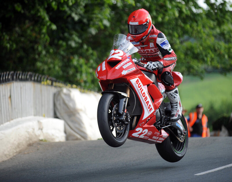 Motorcycle racer in mid-air