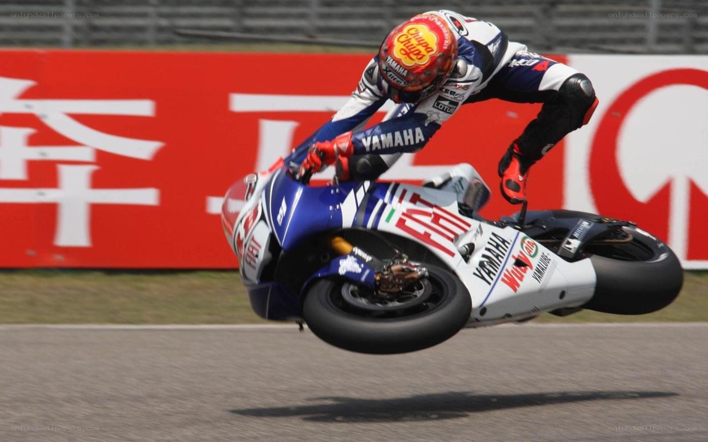 Motorcycle racer in mid-air